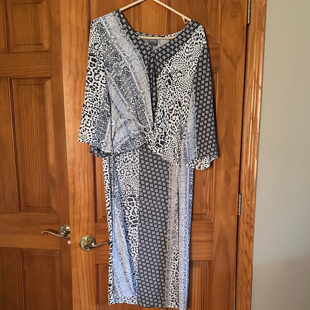 Soho Jeans shades of gray on white background statement blouse great condition